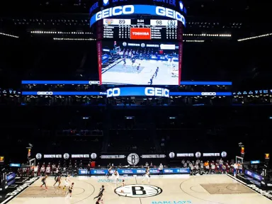 The Nets' black-and-white gear is a staple on Brooklyn streets,...