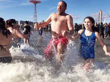 Each year on January 1, members of the Coney Island...