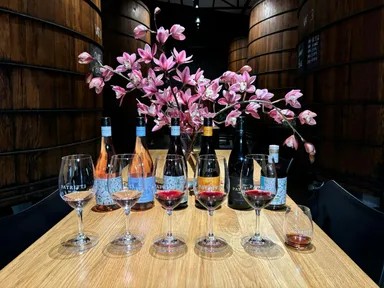 Indulge in an exquisite tasting flight featuring six distinct varieties of Grenache. Begin with a crisp and refreshing dry ros&#233;, explore the depth and complexity