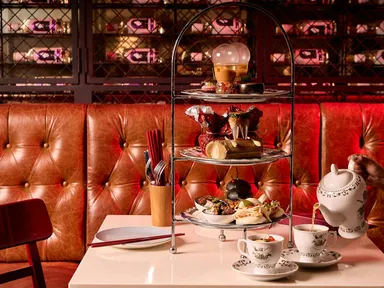 Forget the standard scones and sandwiches and gather for a high tea like no other.