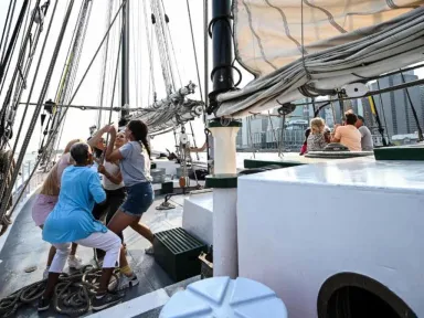 Set sail aboard the historic 1885 schooner...