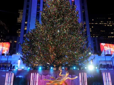 The lighting of Rockefeller Center's towering Christmas tree—traditionally on the...