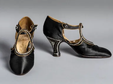 Explore 200 years of changing fashion, labor, and identity through...
