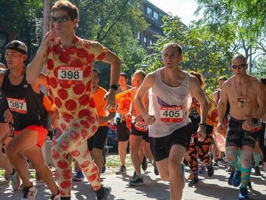 The NYC Pizza Run is a fun and unique challenge where participants tackle a 5K race