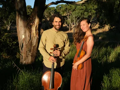 The Bowerbird Collective, comprising Anthony Albrecht, cello, and Simone Slattery, violin, present their cinematic concert experience, Where Song Began. Performed more than 100 times in